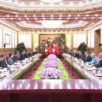 习近平会见加拿大总理卡尼